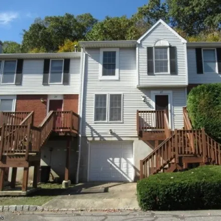Rent this 2 bed townhouse on Cambridge East in Oxford Township, NJ 07863