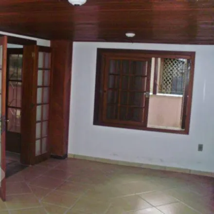Buy this 5 bed house on Rua Glênio Peres in Vila Nova, Porto Alegre - RS