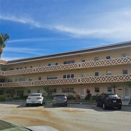 Rent this 2 bed condo on 2383 Netherlands Dr Apt 55 in Clearwater, Florida