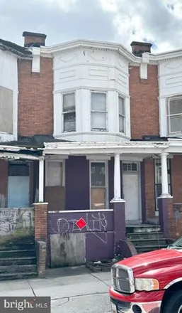 Buy this 3 bed house on 2205 West North Avenue in Baltimore, MD 21216