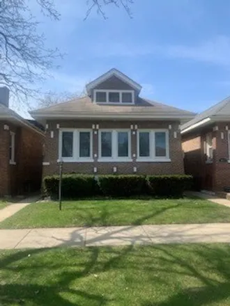 Buy this 4 bed house on 8818 South Parnell Avenue in Chicago, IL 60628