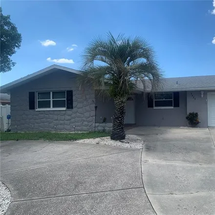 Buy this 2 bed house on 7507 Scottie Drive in Jasmine Estates, FL 34668