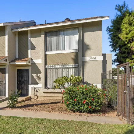 Buy this 3 bed townhouse on 3035 Village Pine Drive in San Diego, CA 92173