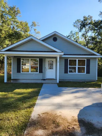 Buy this 4 bed house on 57 Melody Lane in Crawfordville, FL 32327