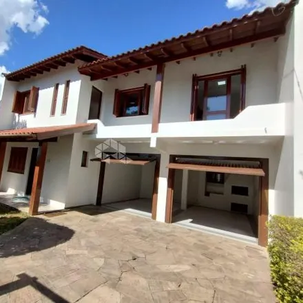 Buy this 4 bed house on Rua Abrelino Gomes in Dom Feliciano, Gravataí - RS