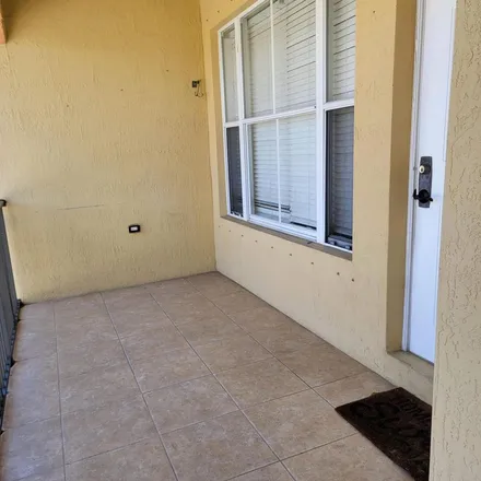 Rent this 2 bed apartment on 1635 Davis Road in Palm Springs, FL 33406