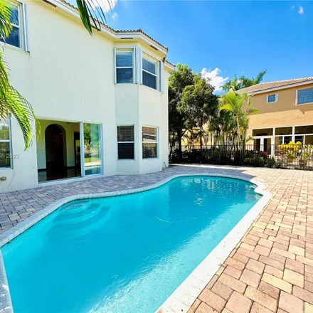 Buy this 4 bed house on 4373 Pomelo Boulevard in Boynton Beach, FL 33436
