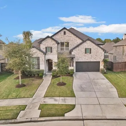 Buy this 4 bed house on 13059 Papineau Woods Drive in Harris County, TX 77346