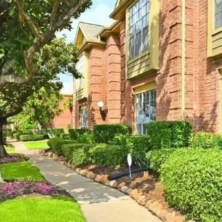 Rent this 2 bed condo on Overbrook Lane in Houston, TX 77077