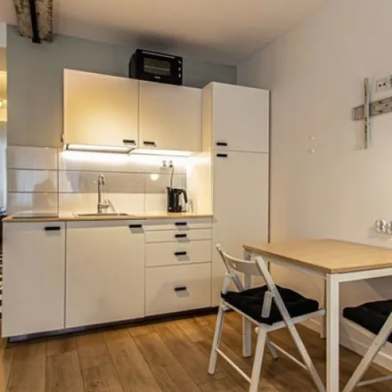 Rent this 1 bed apartment on Świętego Jana in 31-017 Krakow, Poland