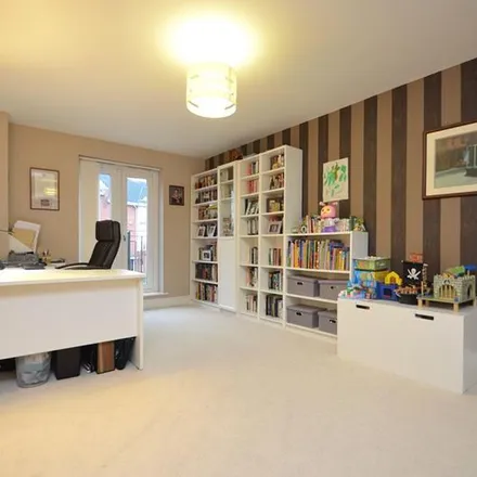 Rent this 4 bed townhouse on Flowerdown Court in Flowers Avenue, London