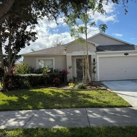 Buy this 4 bed house on 2439 Bayhill Drive in Viera, FL 32940