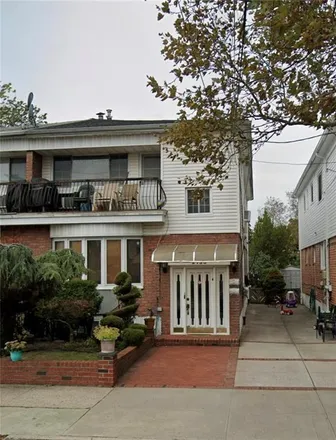 Buy this 6 bed townhouse on 2790 East 65th Street in New York, NY 11234