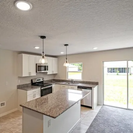 Image 3 - 582 Estes Avenue Southwest, Palm Bay, FL 32908, USA - House for sale