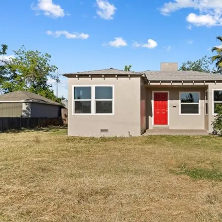 Buy this 3 bed house on 1256 North 11th Avenue in Hanford, CA 93230