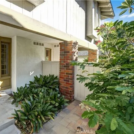 Rent this 4 bed condo on 30 East Yale Loop in Irvine, CA 92604