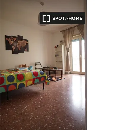 Rent this 2 bed room on Tenmaya in Via Calpurnio Fiamma 47/49, 00175 Rome RM