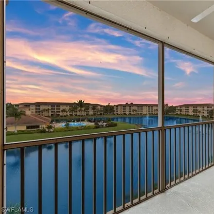 Buy this 2 bed condo on 8488 Kingbird Loop in Belle Lago, Lee County