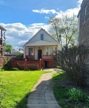 Buy this 4 bed house on 1647 North Latrobe Avenue in Chicago, IL 60639