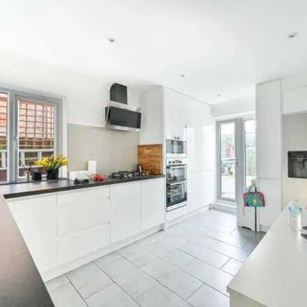Buy this 4 bed townhouse on St. Ann's Hill in London, SW18 2RT