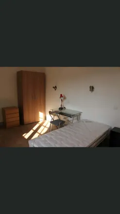 Rent this 26 bed room on Praça do Comércio 22 in 3000-116 Coimbra, Portugal