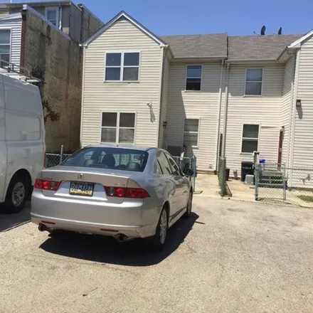 Rent this 4 bed townhouse on 1815 North Gratz Street in Philadelphia, PA 19121