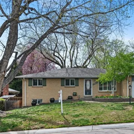 Buy this 4 bed house on 7065 Reed Street in Arvada, CO 80003
