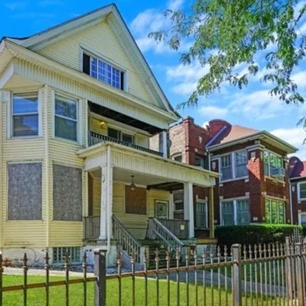 Buy this 4 bed house on 2115 East 72nd Place in Chicago, IL 60649