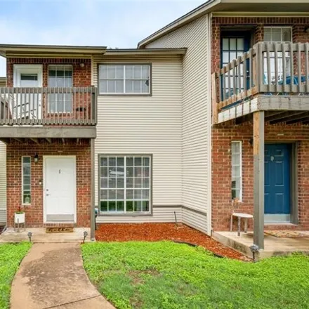 Rent this 2 bed townhouse on 1815 River Crossing Circle in Austin, TX 78741