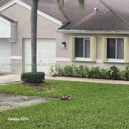 Rent this 3 bed townhouse on 9295 Boca Gardens Parkway in Palm Beach County, FL 33496