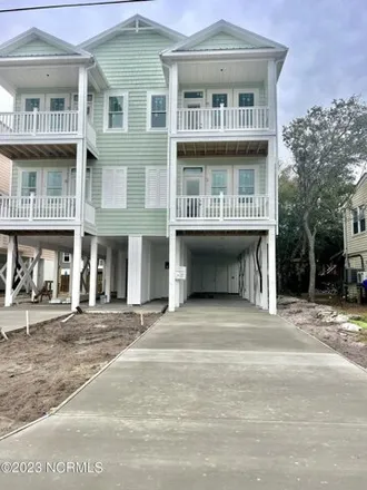 Buy this 4 bed townhouse on 1158 Snapper Lane in Wilmington Beach, Carolina Beach