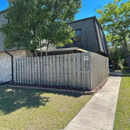 Rent this 2 bed house on 2073 Harrison Street in Whispering Hills Golf Estates, Titusville