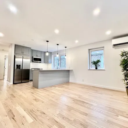 Rent this 2 bed apartment on 60-55 84th Street in New York, NY 11379