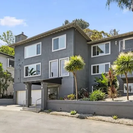 Buy this 4 bed house on 7394 Pacific View Drive in Los Angeles, CA 90068