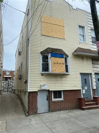 Buy this 4 bed house on 1692 Rockaway Parkway in New York, NY 11236