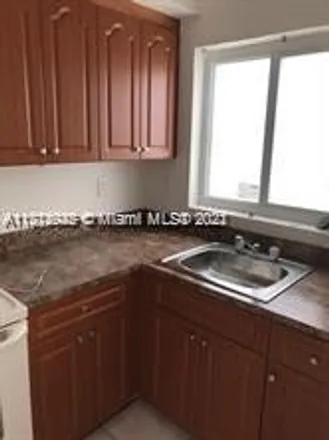 Rent this 4 bed condo on 215 Northwest 84th Street in Little River, Miami-Dade County