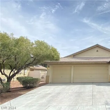 Rent this 4 bed house on 5824 Autumn Damask Street in North Las Vegas, NV 89081