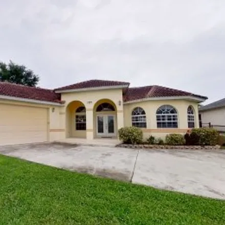 Rent this 4 bed apartment on 1329 Southwest 8Th Place in Trafalgar, Cape Coral