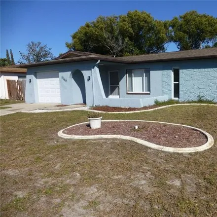 Rent this 2 bed house on 8087 Norwich Drive in Jasmine Estates, FL 34668