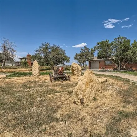 Buy this 4 bed house on 2444 County Road 17 in Brighton, Colorado