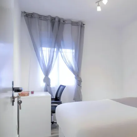 Rent this 5 bed room on Calle de Ramón Luján in 28026 Madrid, Spain