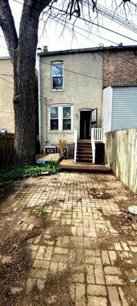 Buy this 4 bed townhouse on 2621 East 74th Street in Chicago, IL 60649