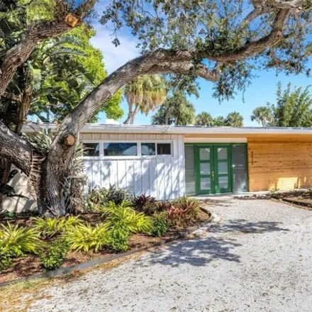Rent this 4 bed house on 4897 Commonwealth Drive in Siesta Key, FL 34242