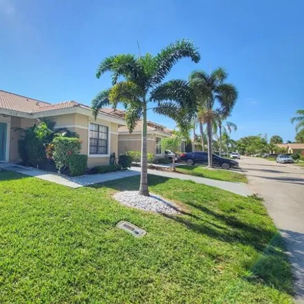 Rent this 2 bed townhouse on 9857 Watermill Circle in Sun Valley, Palm Beach County