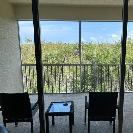 Image 7 - 14525 Abaco Lakes Dr, Unit 204 - Condo for rent