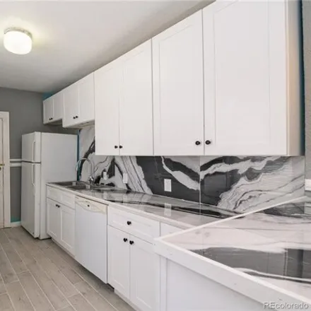 Rent this 2 bed apartment on 1566 Gilpin Street in Denver, CO 80218