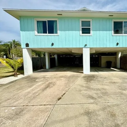 Rent this 3 bed house on 3579 Shore Acres Boulevard Northeast in Saint Petersburg, FL 33703