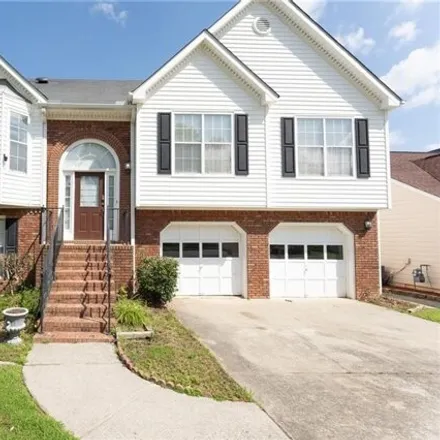Rent this 4 bed house on 4599 Brook Farms Drive in Gwinnett County, GA 30096