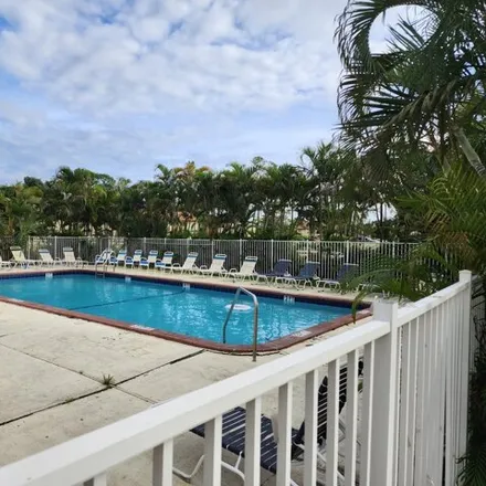 Rent this 2 bed condo on 638 Nottingham Circle in Greenacres, FL 33463