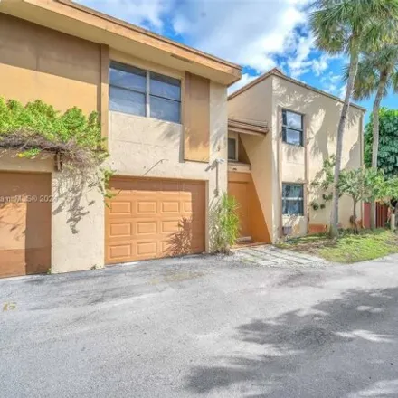 Buy this 2 bed townhouse on 8403 North Missionwood Circle in Miramar, FL 33025